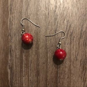 Red spot earrings.